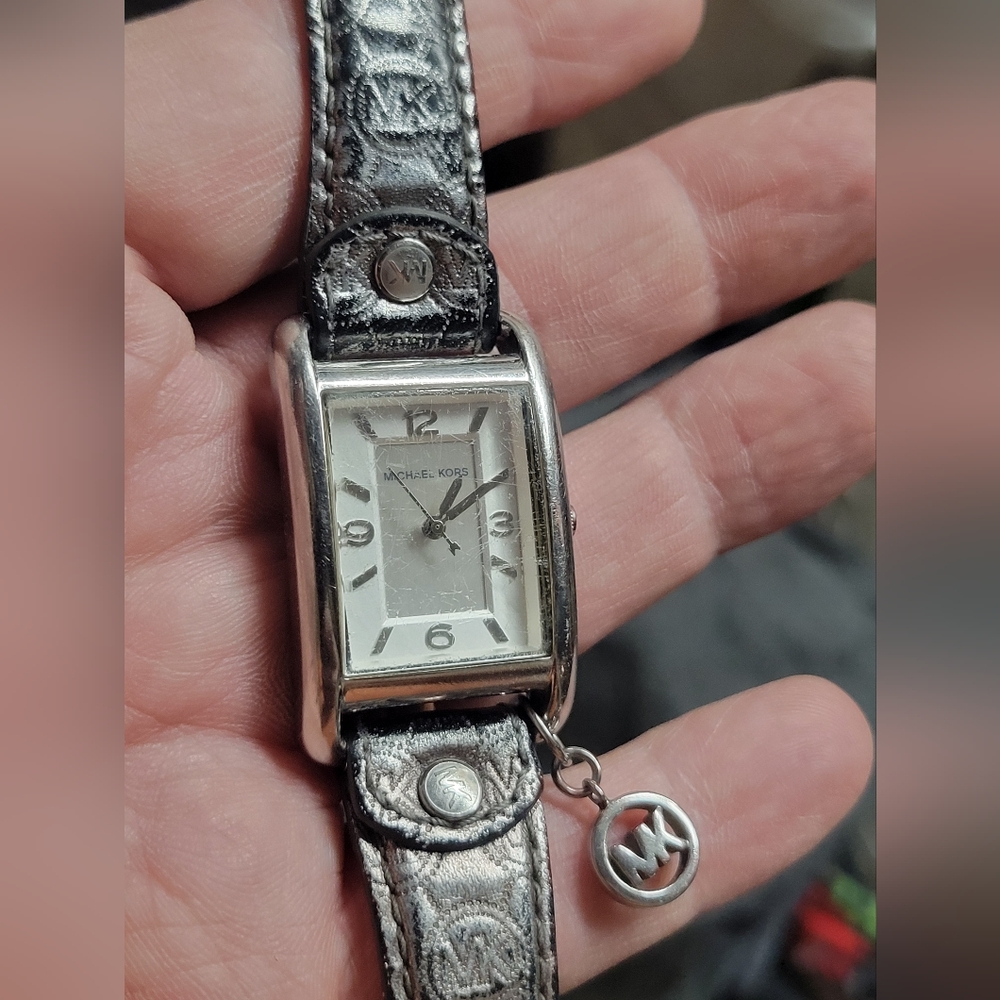 Ladies Michael Kors watch with charm.